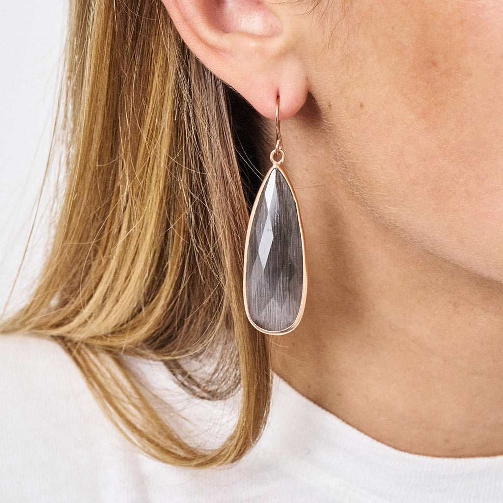 TAN OHRRINGE SCHWARZ